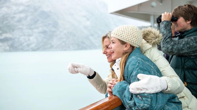 A family enjoying views of Holland America's privileged access to Glacier Bay National Park and Preserve