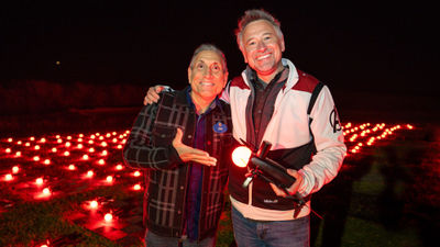 Disney Live Entertainment director of creative development Tom Vazzana (left) and show director Tony Giordano display one of the drones from an upcoming show at Disney Springs.