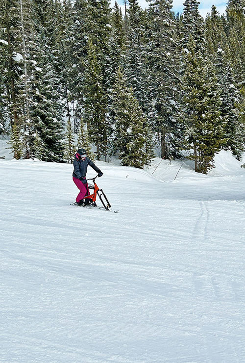 A new Sno-Go user gets the hang of ski biking during a beginners tour at Winter Park Resort.