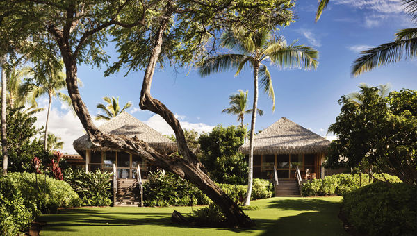 Accommodations at the Kona Village, a Rosewood Resort include standalone bungalows.