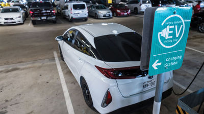 An electric vehicle charging station at Dallas-Fort Worth Airport.