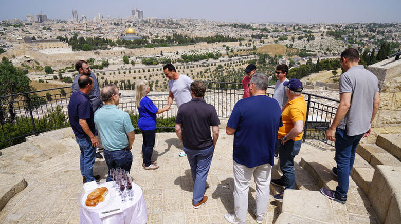 Alex Sharpe, CEO of Signature Travel Network, along with Bryan Leibman, CEO of Frosch, led a small group on a three-day tour of Israel to assess the country's tourism-readiness and show support to their longtime partners in the travel industry there. They visited newly opened tourist sites, including the recently excavated Pilgrimage Road and new home of the National Library, and familiar spots such as Jerusalem's Old City, the Galilee region, the Golan Heights and Tel Aviv. Pictured, a reception welcoming the group to Jerusalem on the Mount of Olives, overlooking the Old City.