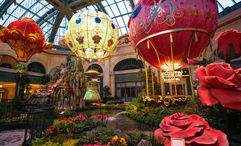 “Higher Love,” on display throughout the summer at Bellagio’s Conservatory & Botanical Gardens, includes seven representations of hot-air balloons.