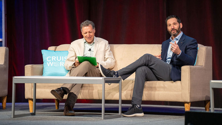 Travel Weekly editor in chief Arnie Weissmann (left) in conversation with Carnival Corp. CEO Josh Weinstein at CruiseWorld.