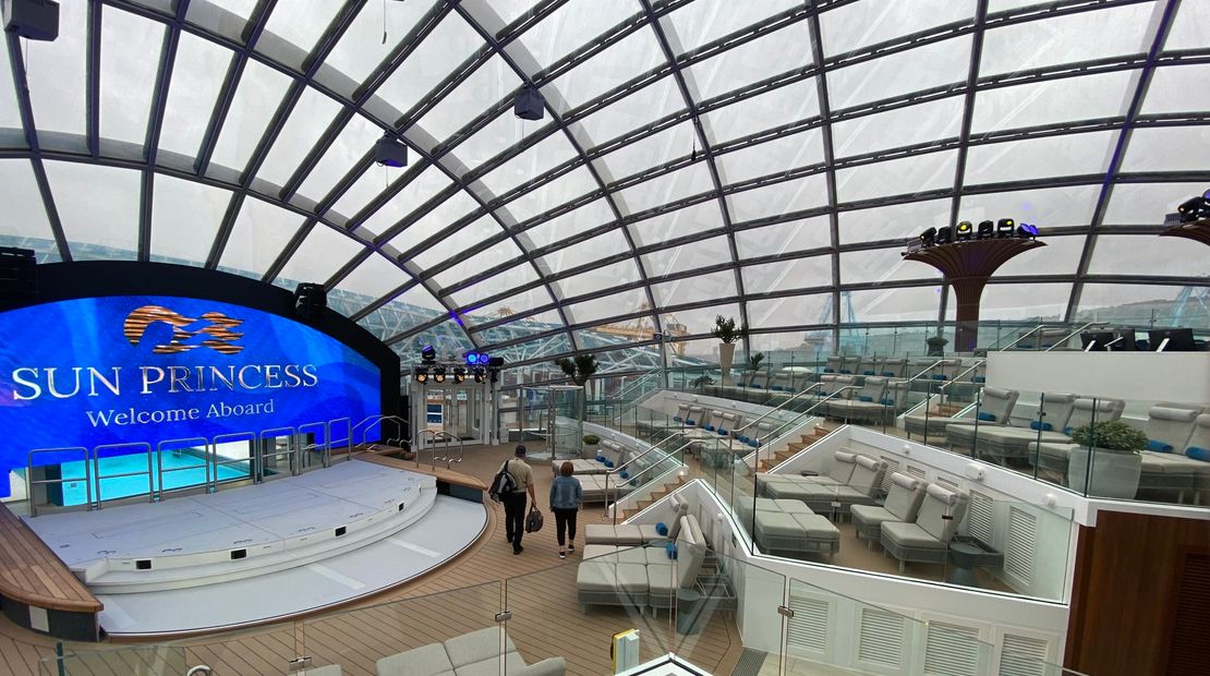 The Dome is filled with plush chaise lounge chairs in an amphitheater-like arrangement.