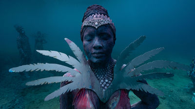 One of 25 statues that comprise the "Coral Carnival" series in Grenada's Molinere Underwater Sculpture Park.