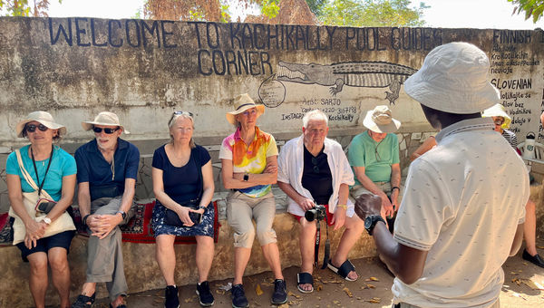 Guests at Kachikally Crocodile Pool in Banjul, the Gambia.