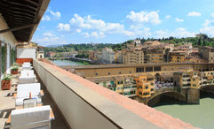 The view from a Superior Suite River View terrace at the Portrait Firenze.