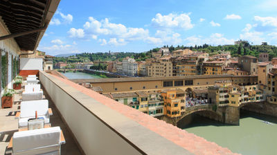 The view from a Superior Suite River View terrace at the Portrait Firenze.