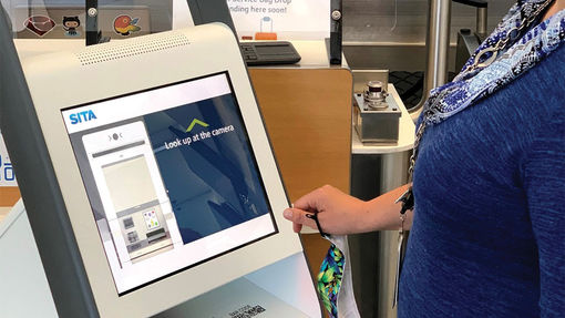 Touchless bag drop used at Dallas-Fort Worth Airport. Analysts predict more touchless and biometric options will be evident in U.S. airports next year.