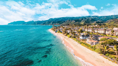 The Courtyard by Marriott Oahu North Shore is right across the street from a long white-sand beach.