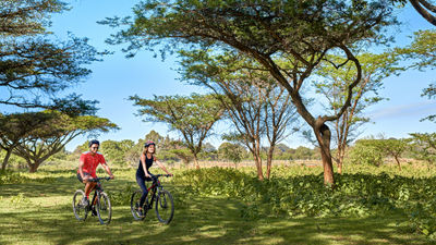 Fairmont Mount Kenya Safari Club offers safaris by bicycle.