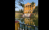 The 19th-century Kathgola palace with its reflecting pond and gardens, was built by wealthy local merchants in Murshidabad, India, in the classical Palladian style.