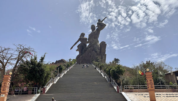 The African Renaissance Monument is a larger-than-life bronze statue that sits atop the hills of Collines des Mamelles.