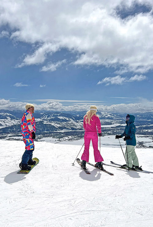 The author’s daughter, right, asks a Barbie (with a snowboarding Ken) what Gaper Day was all about at Jackson Hole Mountain Resort.