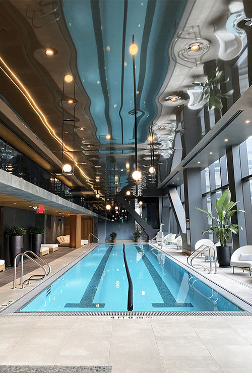 The hotel's 20-meter lap pool is bathed in the light from floor-to-ceiling windows.