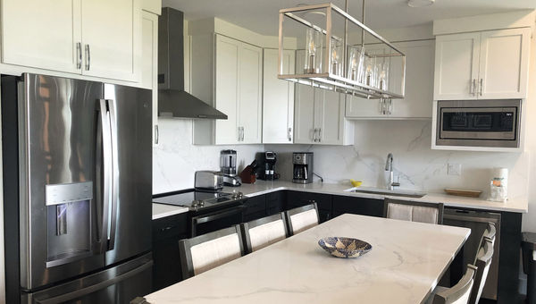 The kitchen of a condo unit adjacent to the main resort. Condo owners can enjoy resort amenities and have their units managed by the resort's rental program.