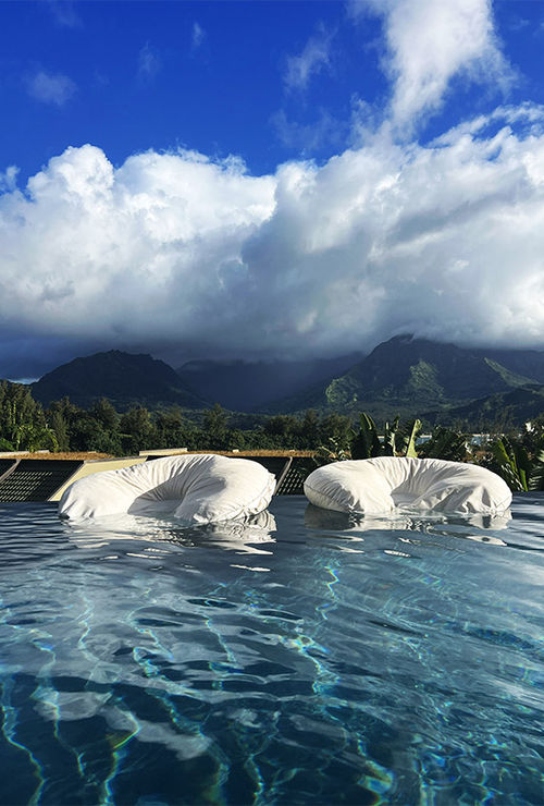 The resort's adults-only infinity pool has floating chairs from which guest can admire the surroundings.