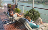 The sweeping Sun Deck on the Raj Mahal is lined with comfortable seating for river views and relaxing in the sun; a bar in the center offered tea, drinks and cookies for much of the day.