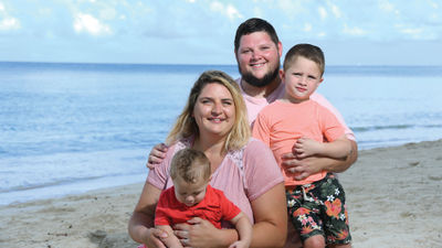 Jordana Izzo, director of accessible travel at Travelmation, with her husband, Guy, and sons Salvatore, 5, and Leonardo, 2, at Beaches Turks and Caicos.