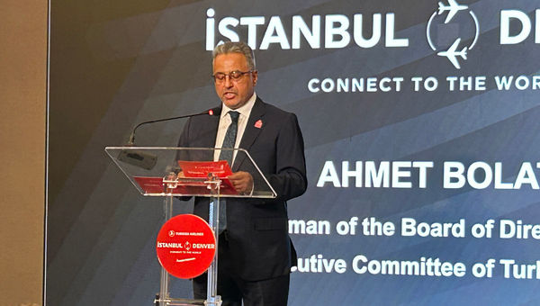 Turkish Airlines chairman Ahmet Bolat speaks at a gala celebrating the carrier's first flight to Denver.